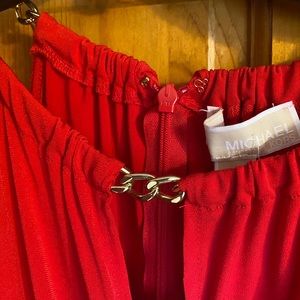 A Michael Michael Kors blouse. Never worn. Size XM. Red